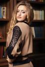 Women's beige top with lace and leather elements Avangard