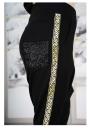 Women's pants type poture with golden edging  Avangard