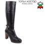 Women's black leather boots with back zipper and decorative strap with buckle 32807