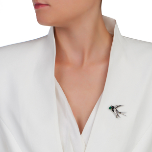 Silver swallow brooch with hand painted feathers and big green zicon Swan